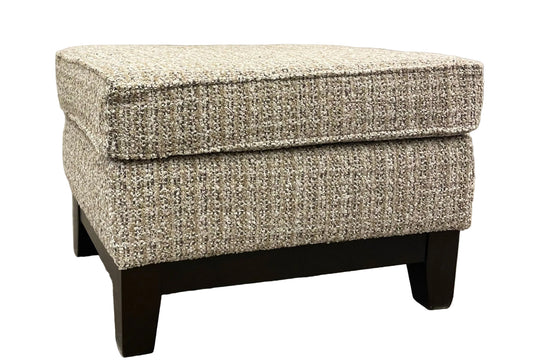 Neutral tone boucle upholstered ottoman on espresso stain wood legs