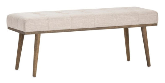 Beige upholstered bench with tufted cushion atop pecan stain wooden legs