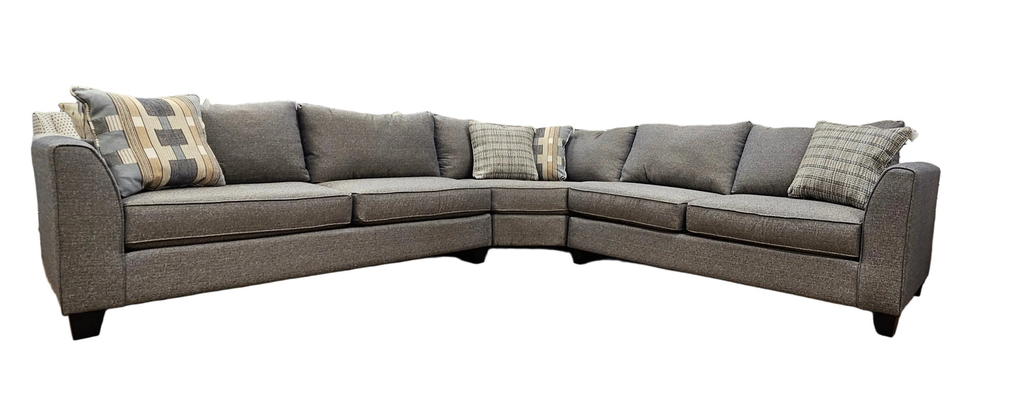 Three piece blue gray sectional sofa on java stain wood feet