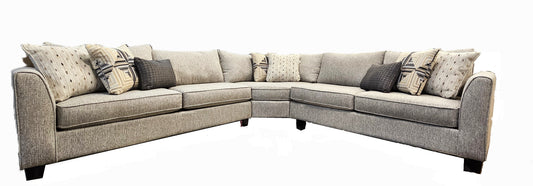 Gray and white tweed three piece sectional with flared track arms on java stain wood feet