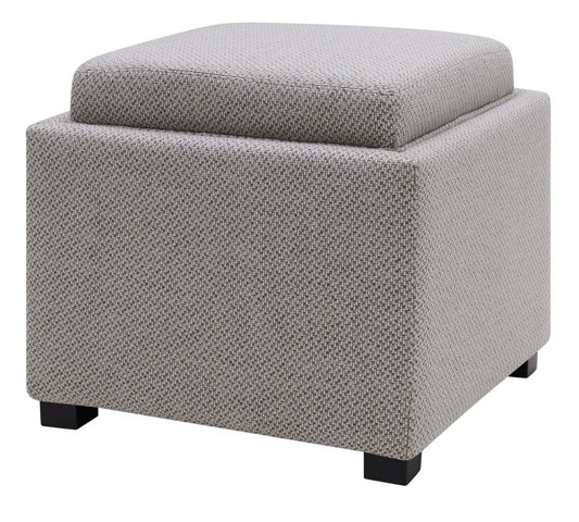 Gray textured ottoman with a cushion on espresso square feet