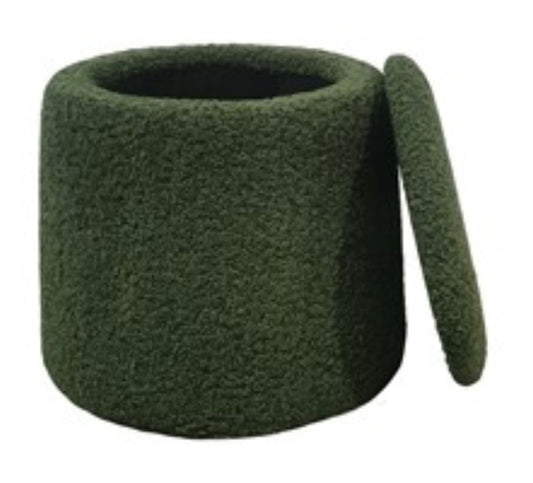 A round green storage ottoman with a a removable top in a chenille textured upholstery.